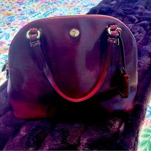 Rich purple Coach purse. Very good condition, used only a few times.